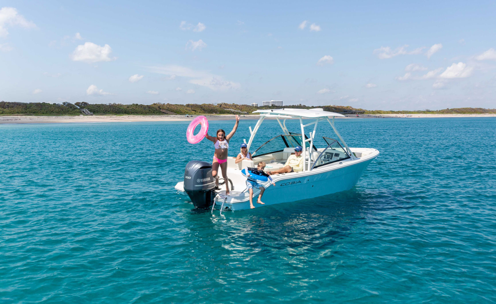 240 DC Kids swiming by boat