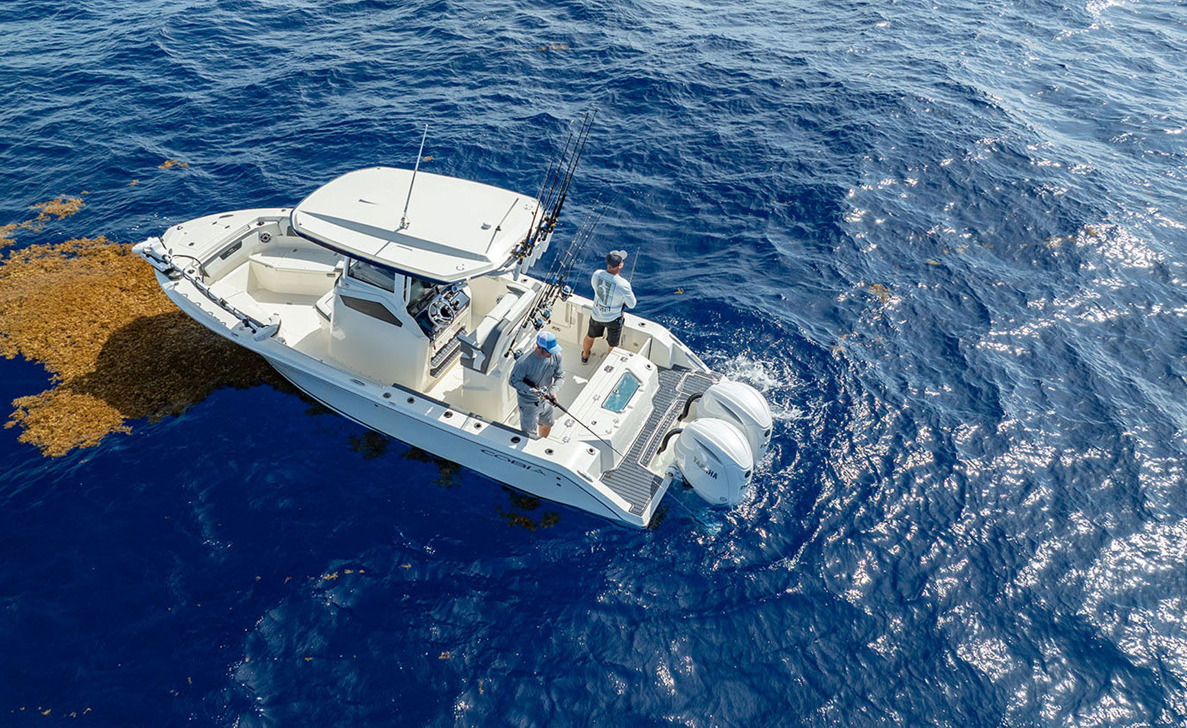 245 CC Boat with fishers on it