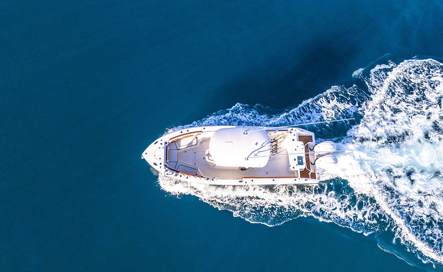 285 CC boat on water arial view