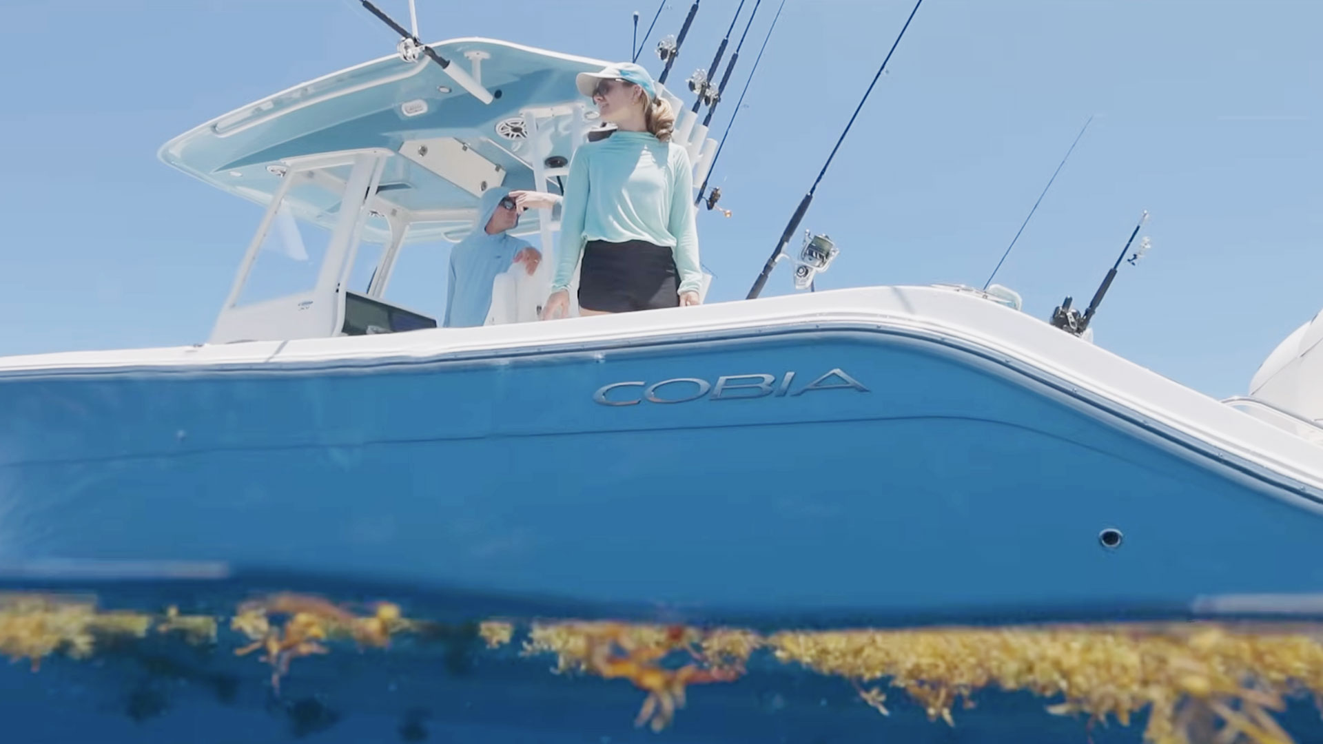 woman fishing off boat
